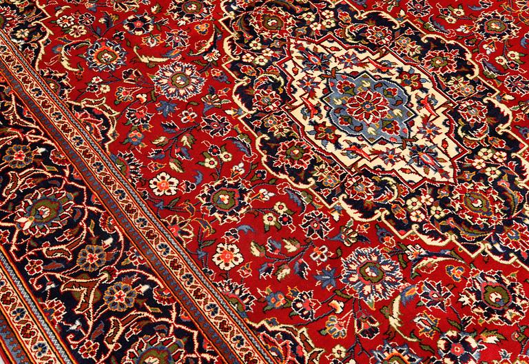A Keshan carpet, 304 x 203 cm.