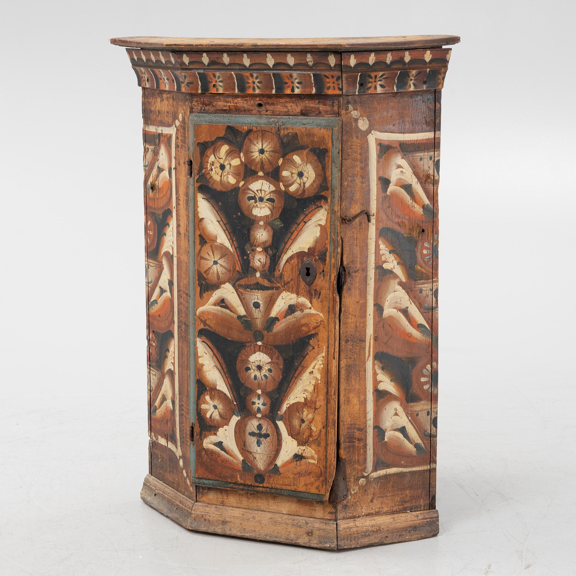 A Swedish traditional painted corner cabinet, Dalarna, 18th-/19th century.