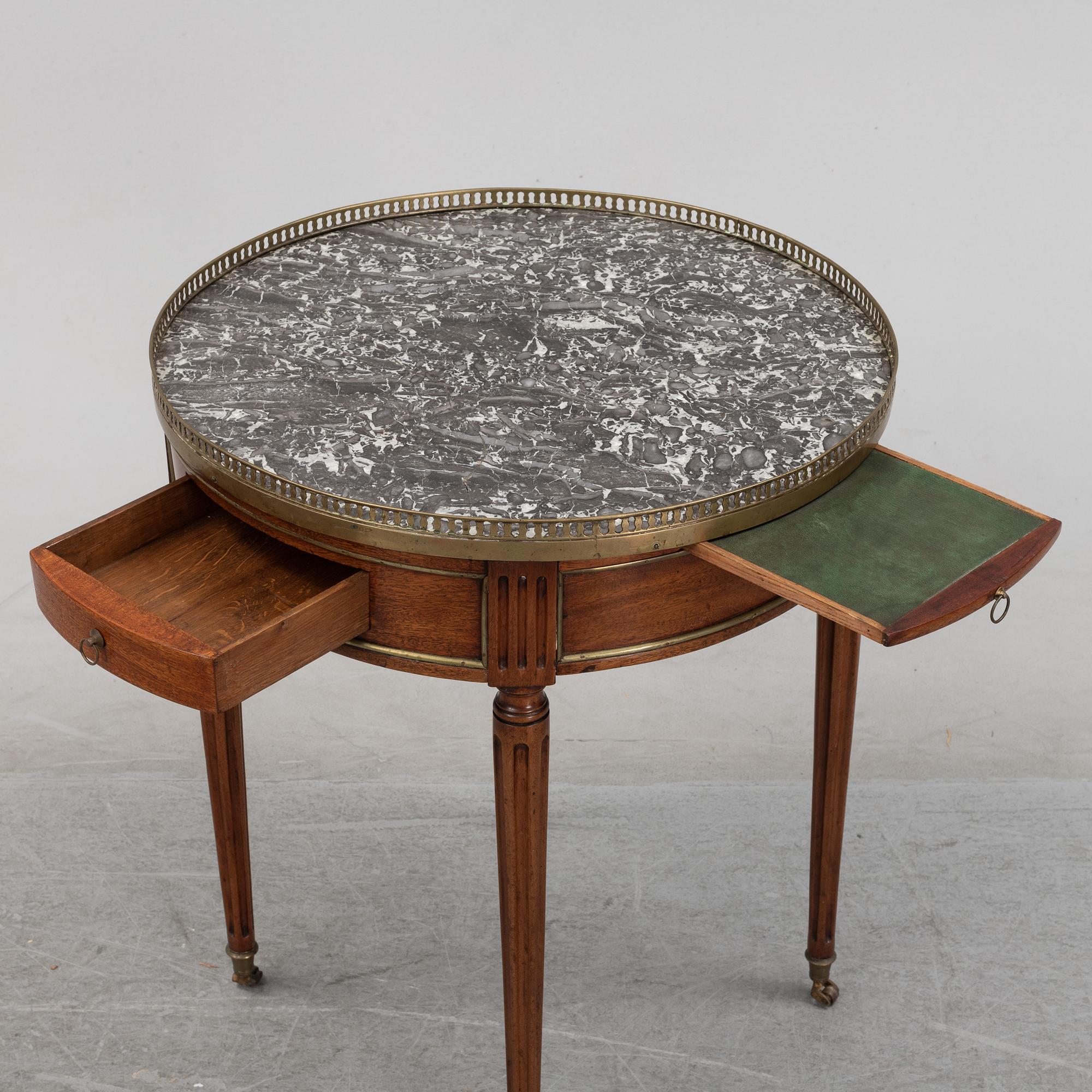 A Louis XVI-style table end of the  19th Century.