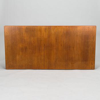 Carl Gustaf Hiort af Ornäs, a mid-20th Century dining table and eight chairs for  för HMN Huonekalu Mikko Nupponen.