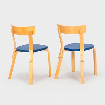 Alvar Aalto, two model 69 chairs, O.Y. Huonekalu- ja Rakennustyötehdas A.B, 1957.