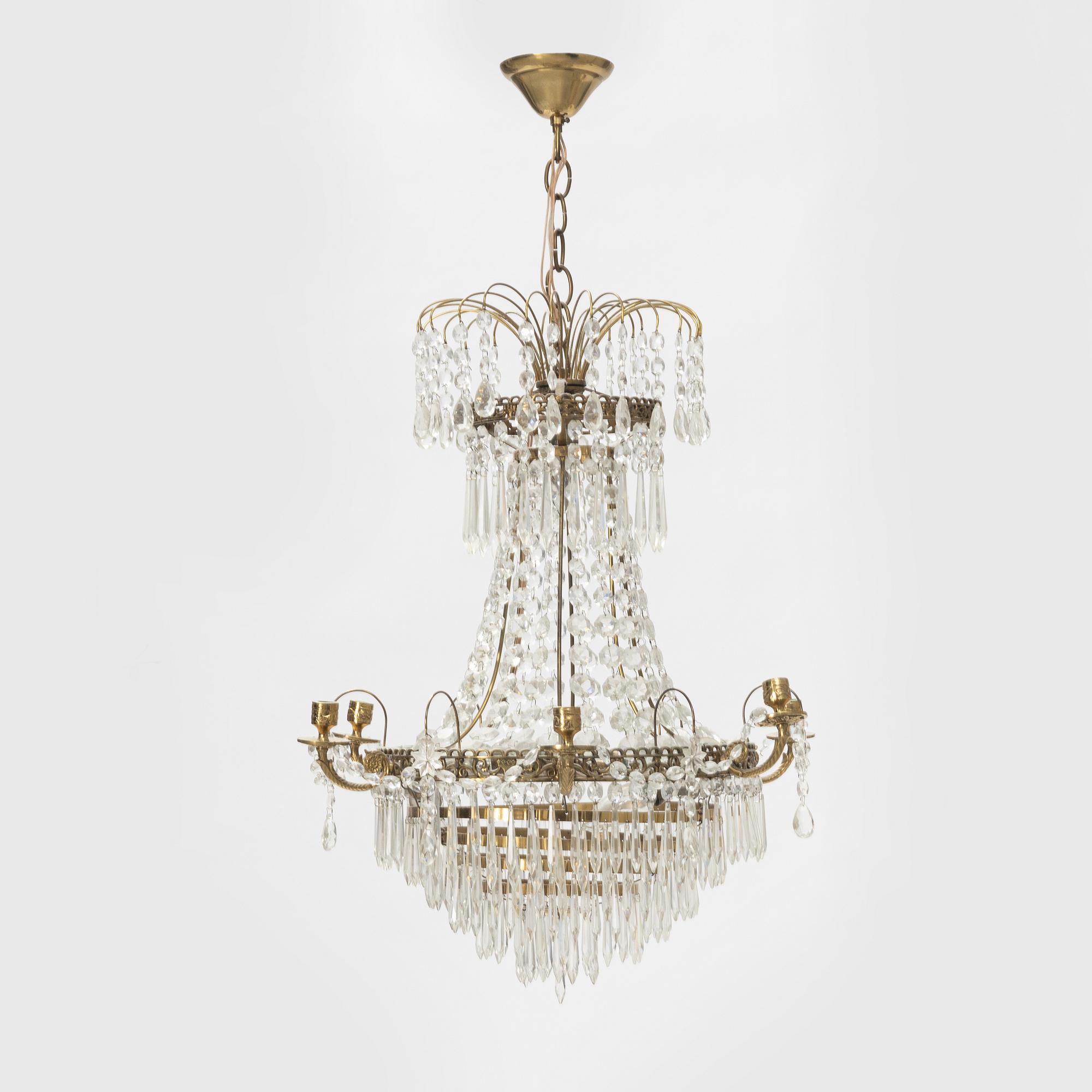 An Empire style chandelier, later part of the 20th Century.