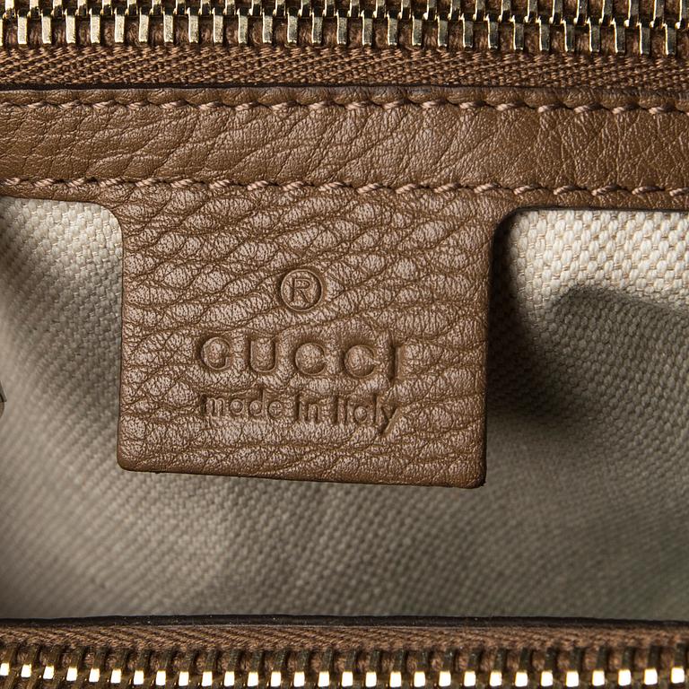 A bag "Bamboo shopper" by GUCCI.