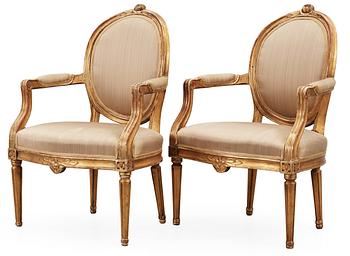 591. A pair of Gustavian late 18th century armchairs.