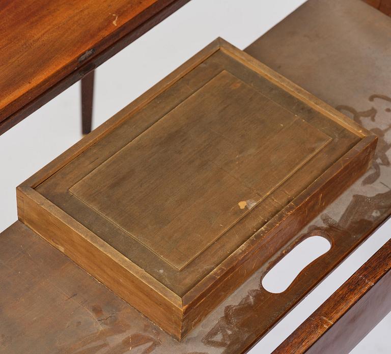 A Gustavian 'concertina action' mahogany games table by Georg Haupt (master in Stockholm 1770-84).