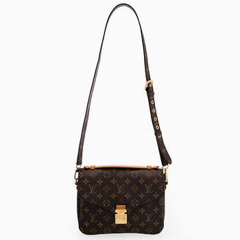 Louis Vuitton, a Monogram Canvas 'Pochette Metis' bag.