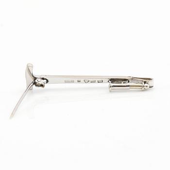 Brooch in 18K white gold shaped like a riding crop with rose-cut diamonds, G. Dahlgren & Co Malmö 1944.
