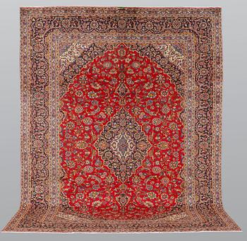 A carpet, Kashan signed, ca 385 x 293 cm.