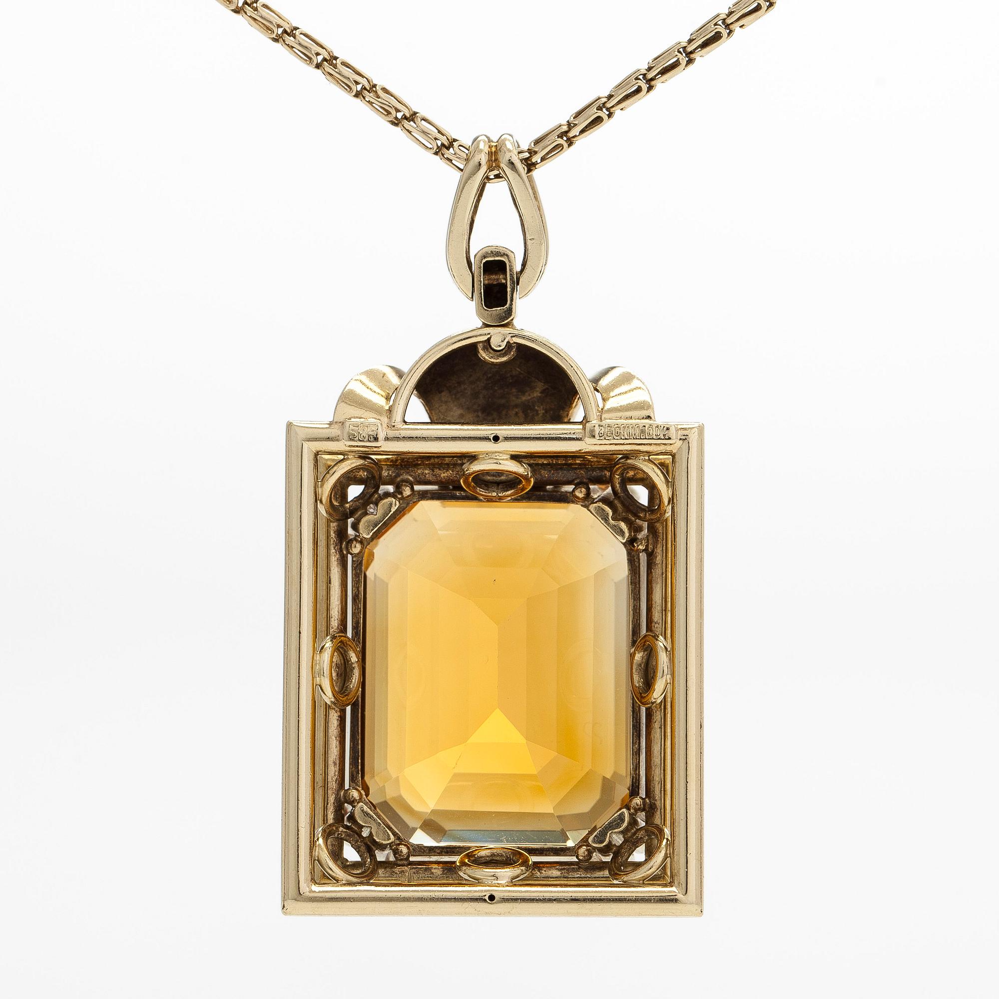 Necklace with pendant, 14K gold and a faceted citrine.