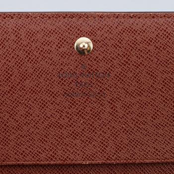LOUIS VUITTON, a monogram canvas wallet.