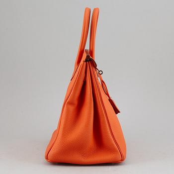 HERMÈS, Orange feu togo leather 'Birkin 35', 2015.