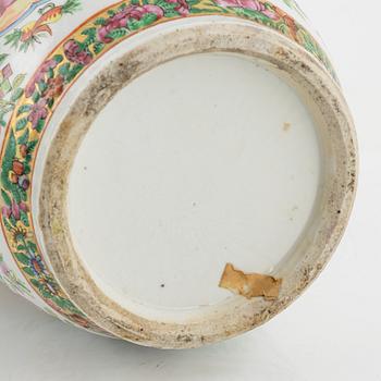 A famille rose porcelain vase, Kanton, and a porcelain urn, China, end of the 19th century.