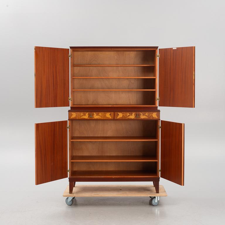 Carl Malmsten, a mahogany-veneered cabinet, AB J.O. Carlsson Möbelindustri, Vetlanda, sweden, around mid 20th century.