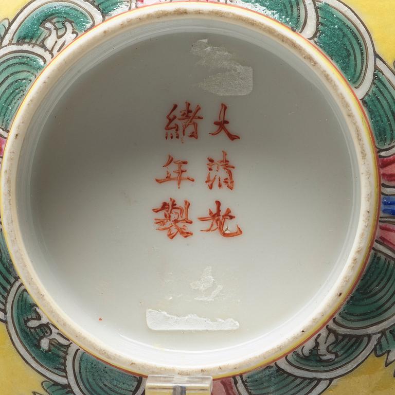 A pair of yellow glazed bowl, Qing dynasty with Guangxu mark in red.