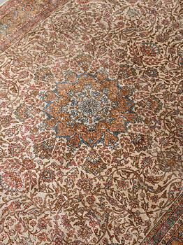 A carpet, an old silk Turkey, ca 237,5 x 146,5  cm (as well as 3,5-4 cm flat weave at the ends).