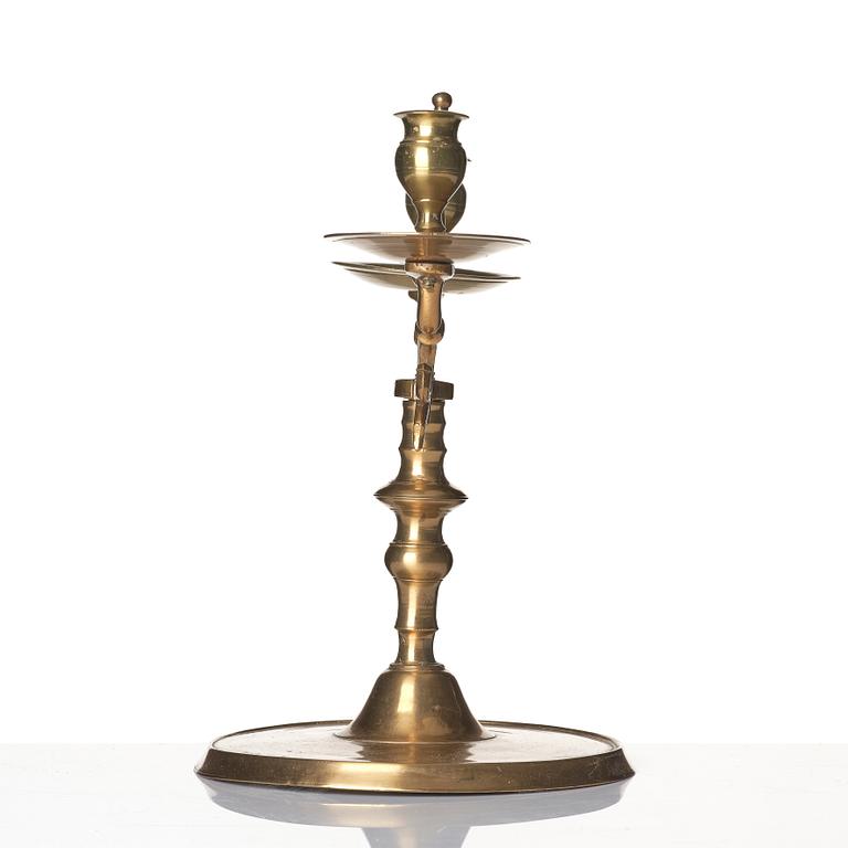 A baroque brass two-branch candelabra, Northern Europe/Sweden, 17th century.