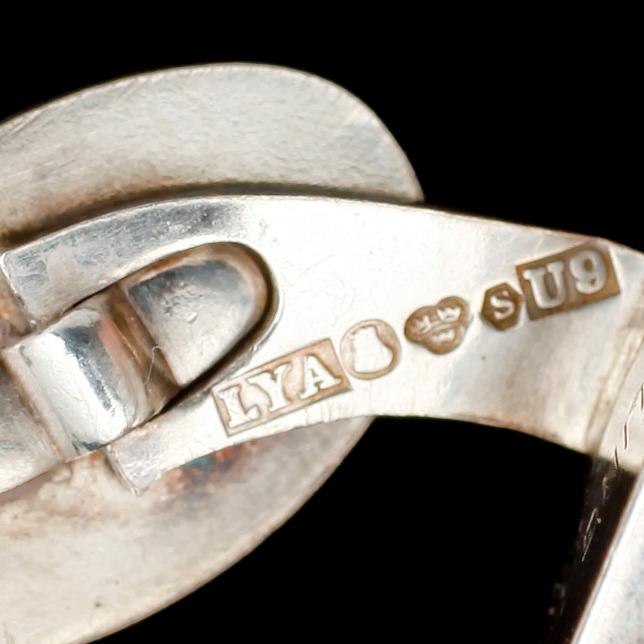 MANSCHETTKNAPPAR, 1 par samt SLIPSNÅL, silver.