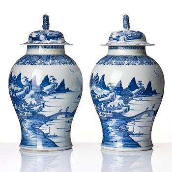 A pair of blue and white Chinese porcelain jars with covers. Qing dynasty, Qianlong (1736-95).