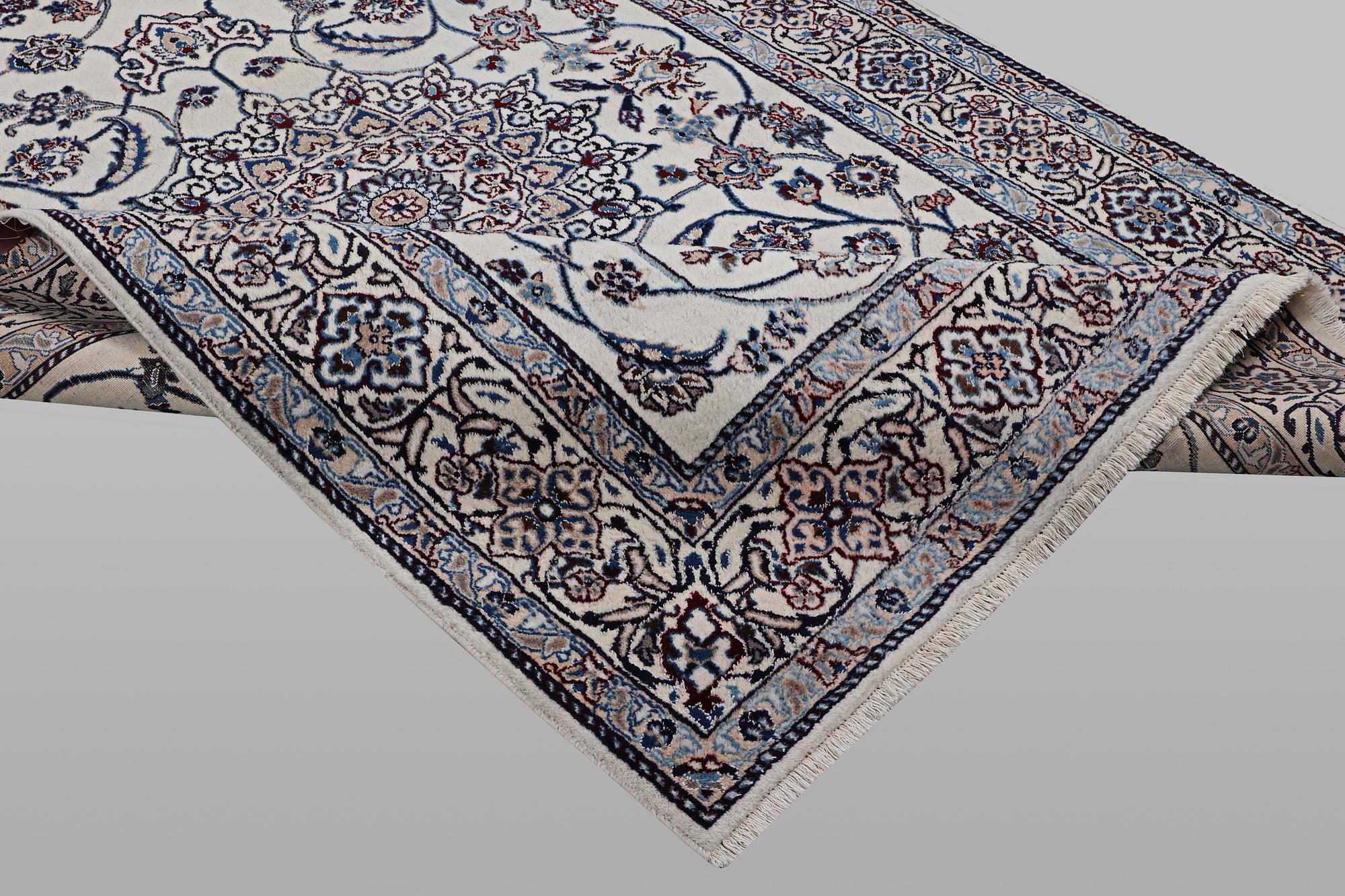 A carpet, Nain, part silk, 9 laa, ca 290 x 196 cm.