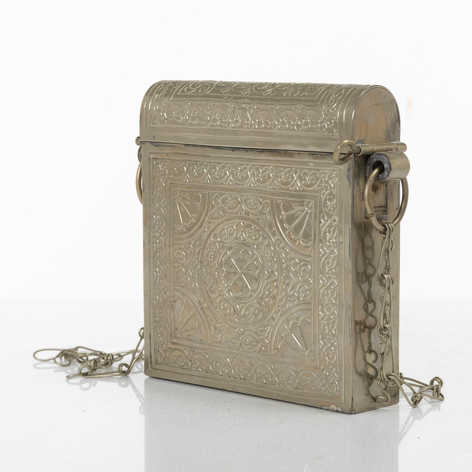 A silver plated Quran case, Noth Africa, circa 1900.