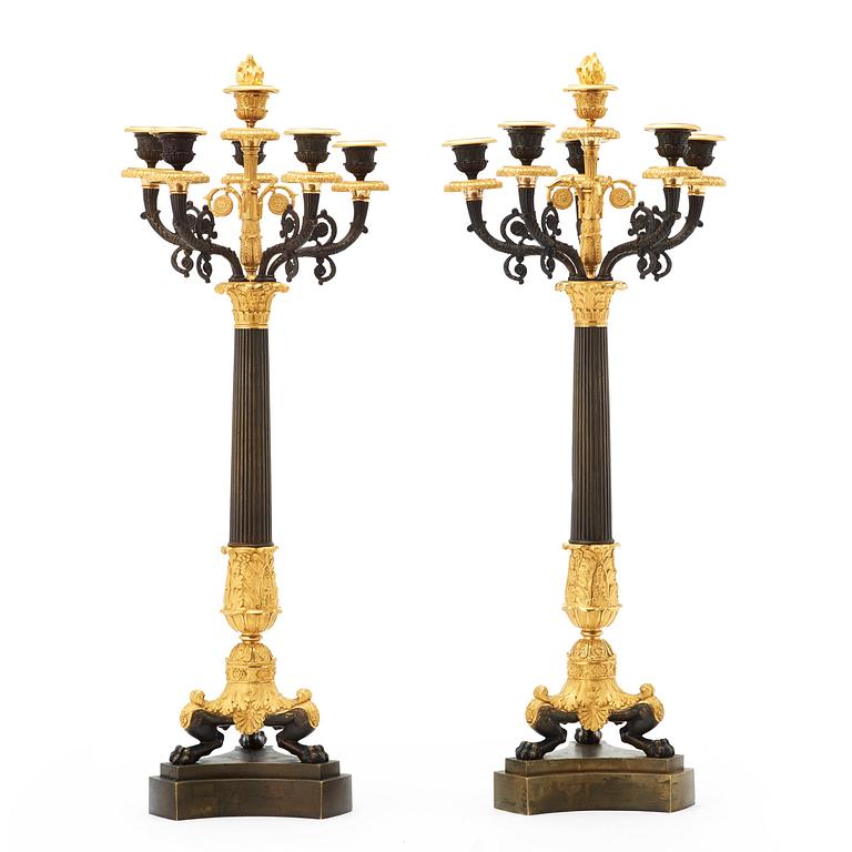 A pair of French Empire 19th century six-light candelabra.