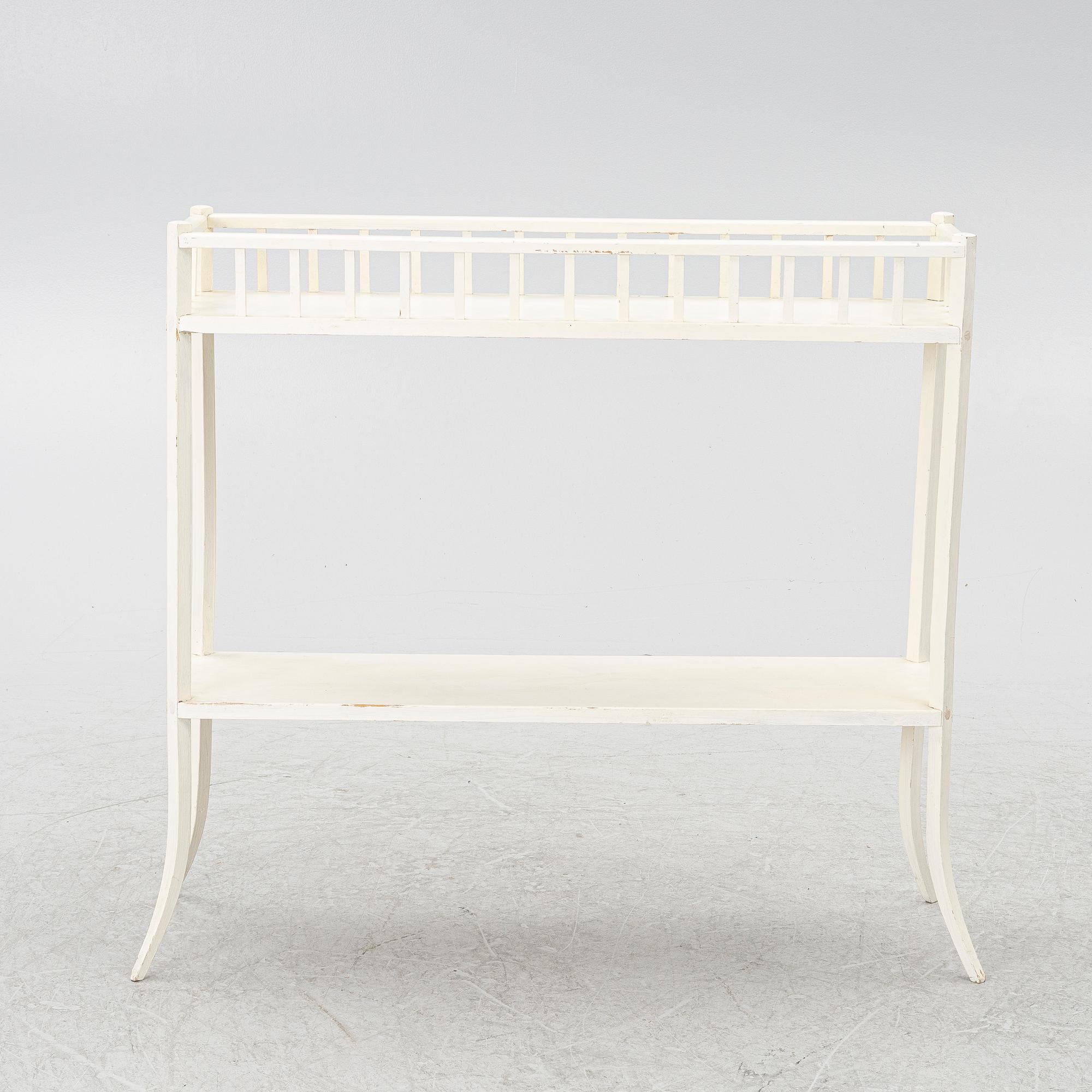 A plant stand, circa 1900.