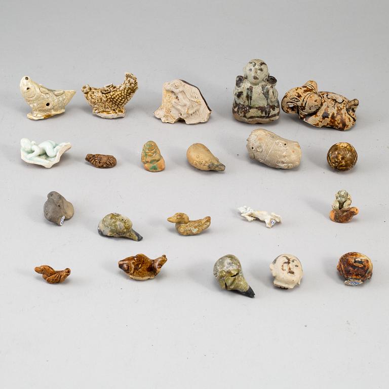 A group of 21 Southeast asian ceramic figurines/sculptures,  19-20th century.