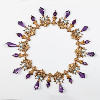 A Victorian amethyst and aquamarine necklace.