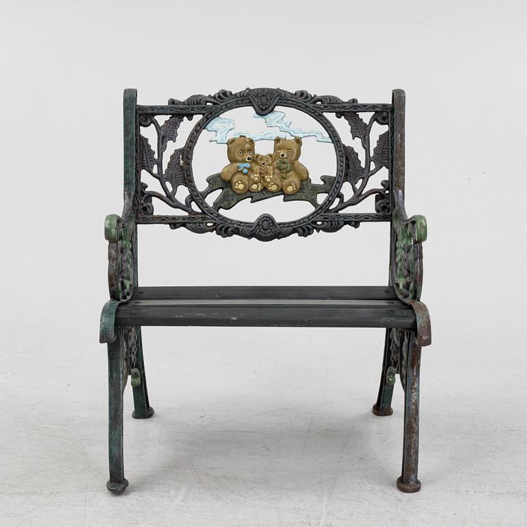 A children's cast iron garden sofa and armchair, mid 20th century.