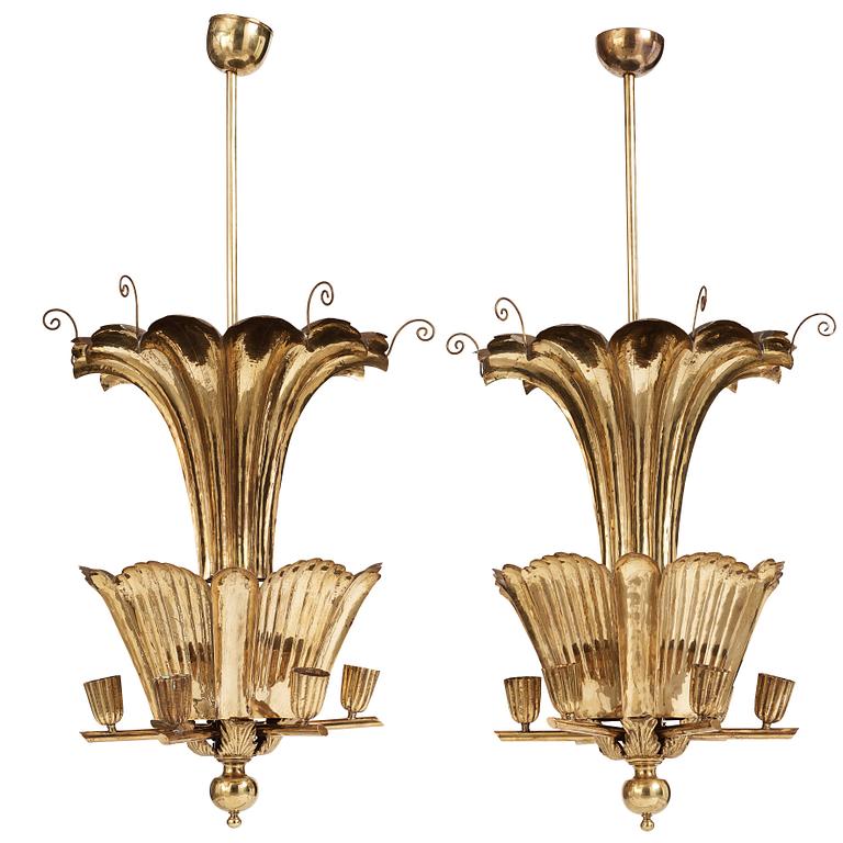 A.W. Borgh, a pair of Swedish Grace brass chandeliers, probably 1920-1930's.