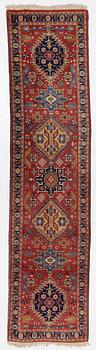 A semi-antique Kurdish runner, 350 x 140 cm.