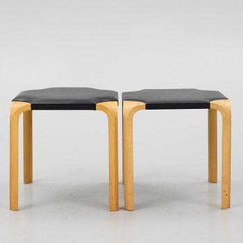 Alvar Aalto, a pair of 'X601' stool for Artek, later half of the 20th century.