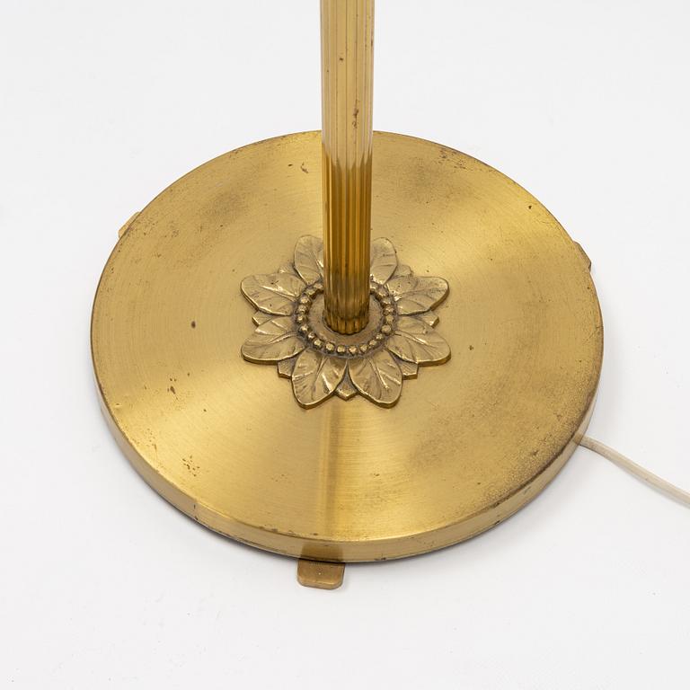A Swedish Grace brass floor lamp, first part of the 20th Century.