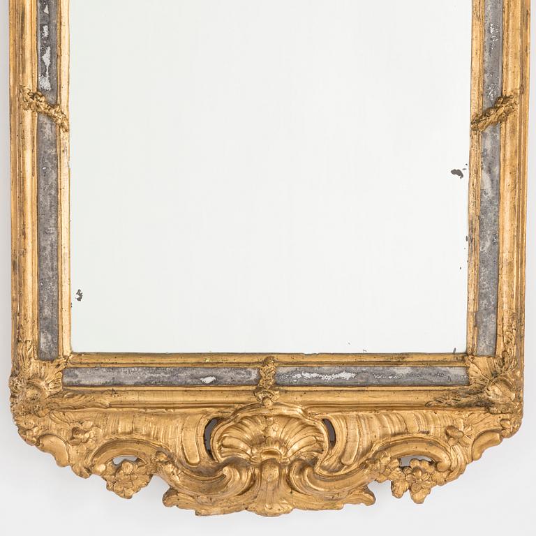 A mid 18th century rococo mirror.