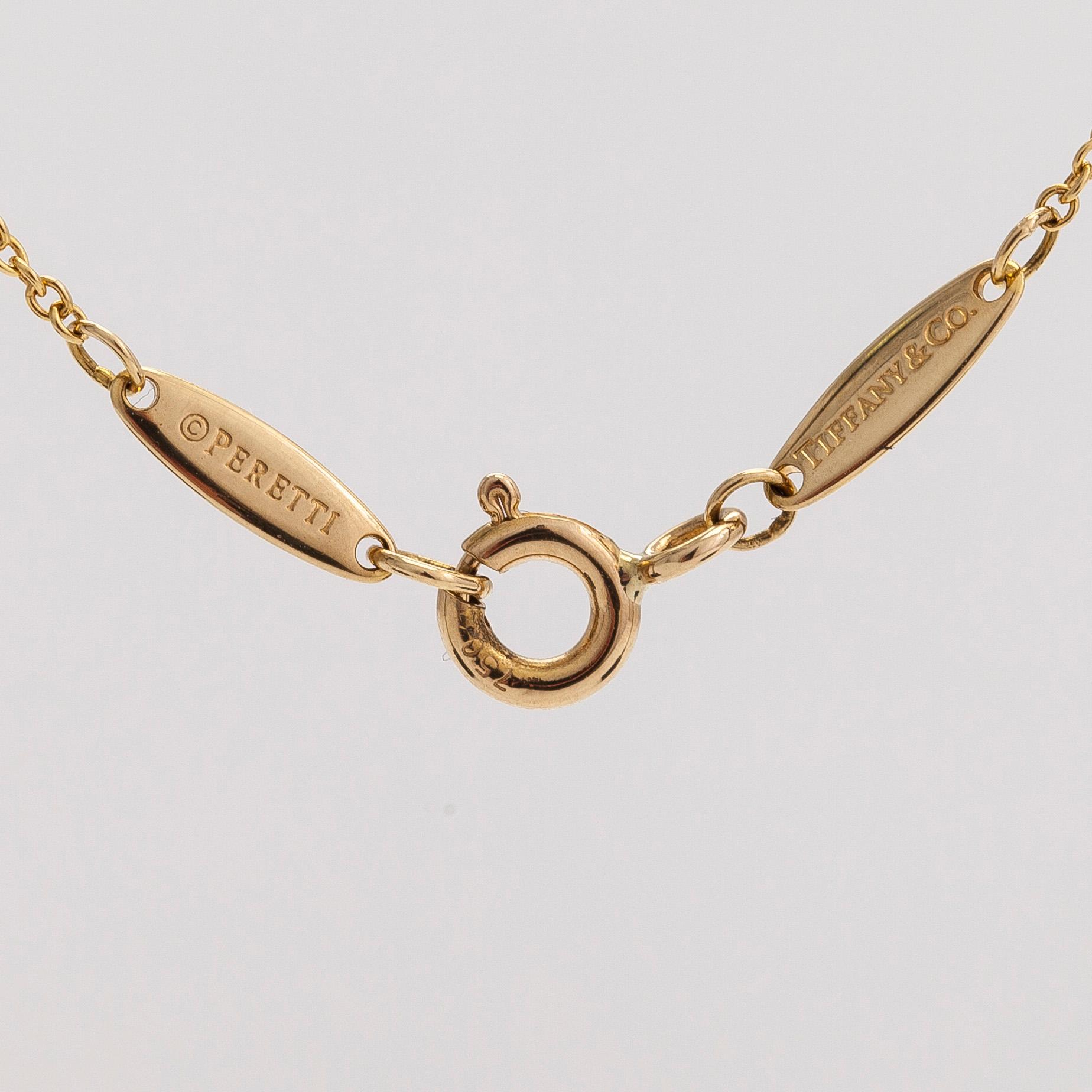 Tiffany & Co, Elsa Peretti, an 18K gold necklace with a ca. 0.05 ct diamond.