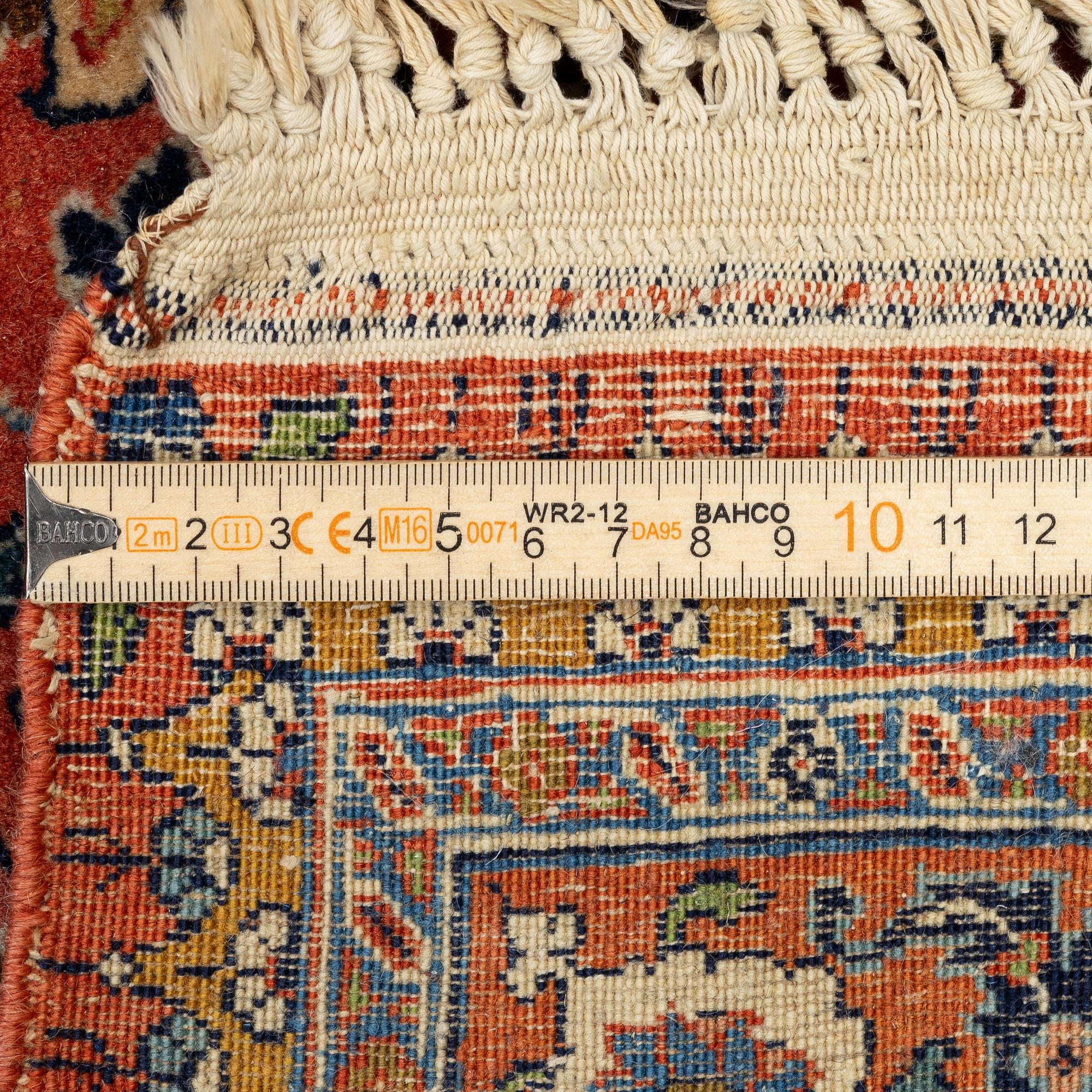 A semi-antique Tabriz carpet, Northwest Persia, c. 280 x 196 cm.