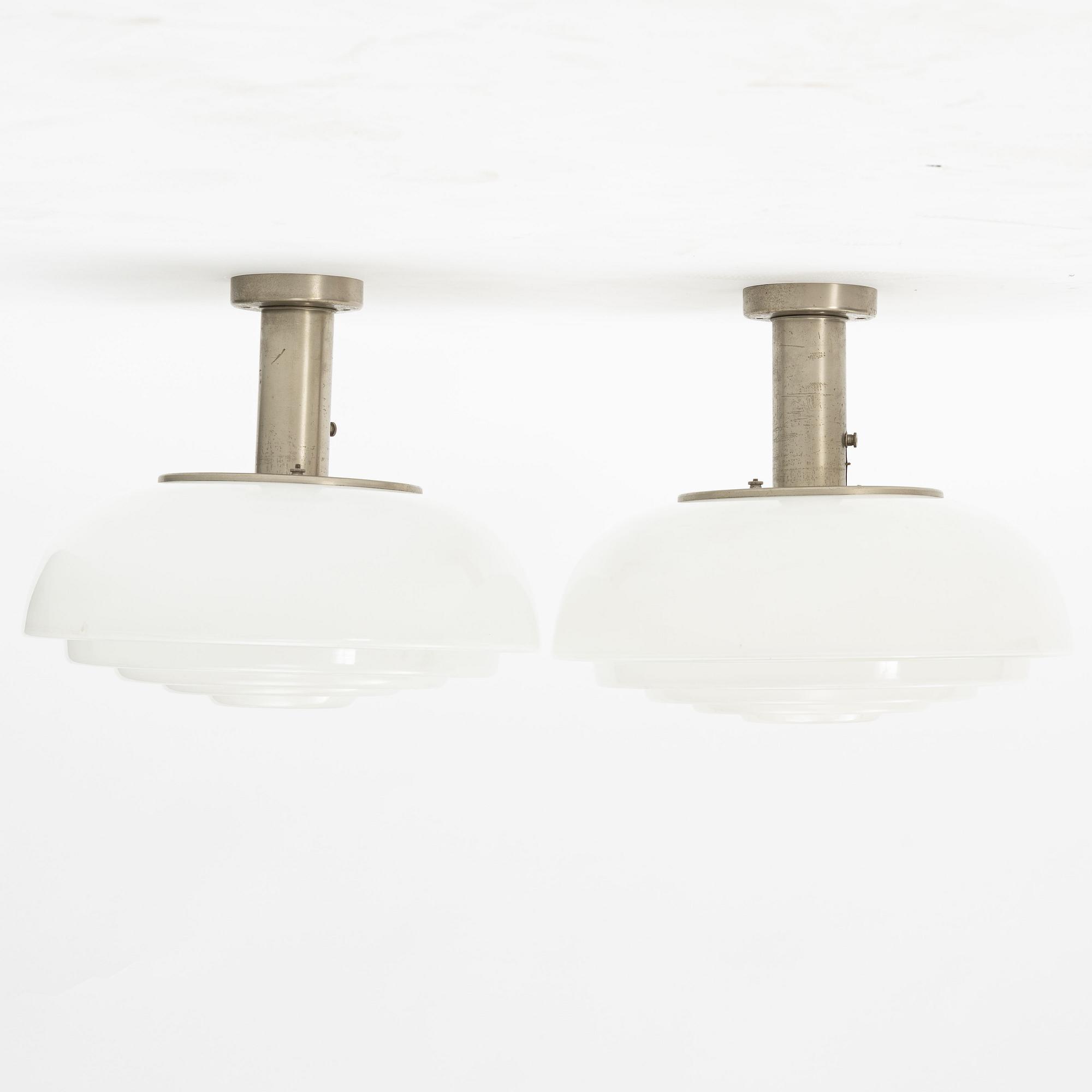 Harald Notini, a pair of ceiling lamps, model "11321", Arvid Böhlmarks Lampfabrik, 1940s.