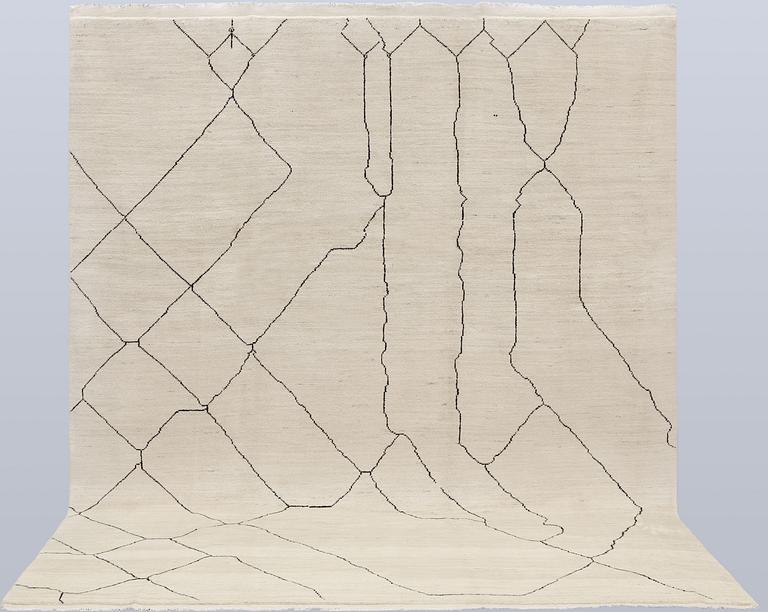 A Moroccan carpet, 305 x 251 cm.