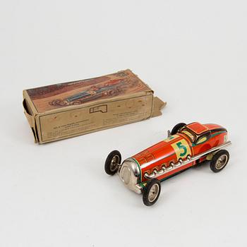 A JNF tinplate racing car 1930/40s.