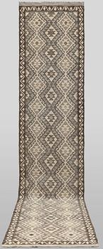 A Kilim runner, approx. 402 x 88 cm.