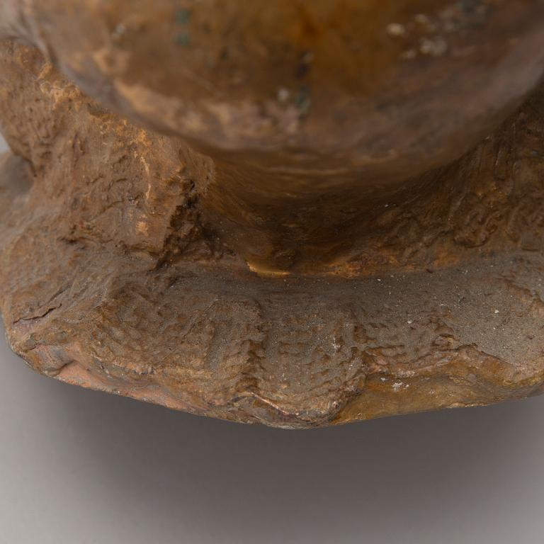 A gilt terracotta sculpture signed Matti Haupt.