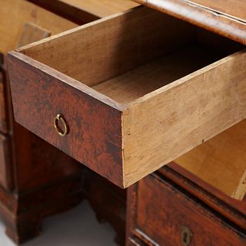 A Swedish late Baroque alder-veneered 'knee-hole' writing desk, first part of the 18th century.
