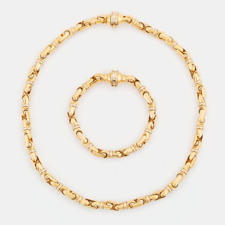 An 18K gold necklace/bracelet combination.