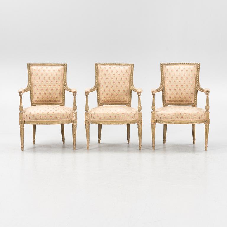 Three Louis XVI armchairs, France, late 18th century.