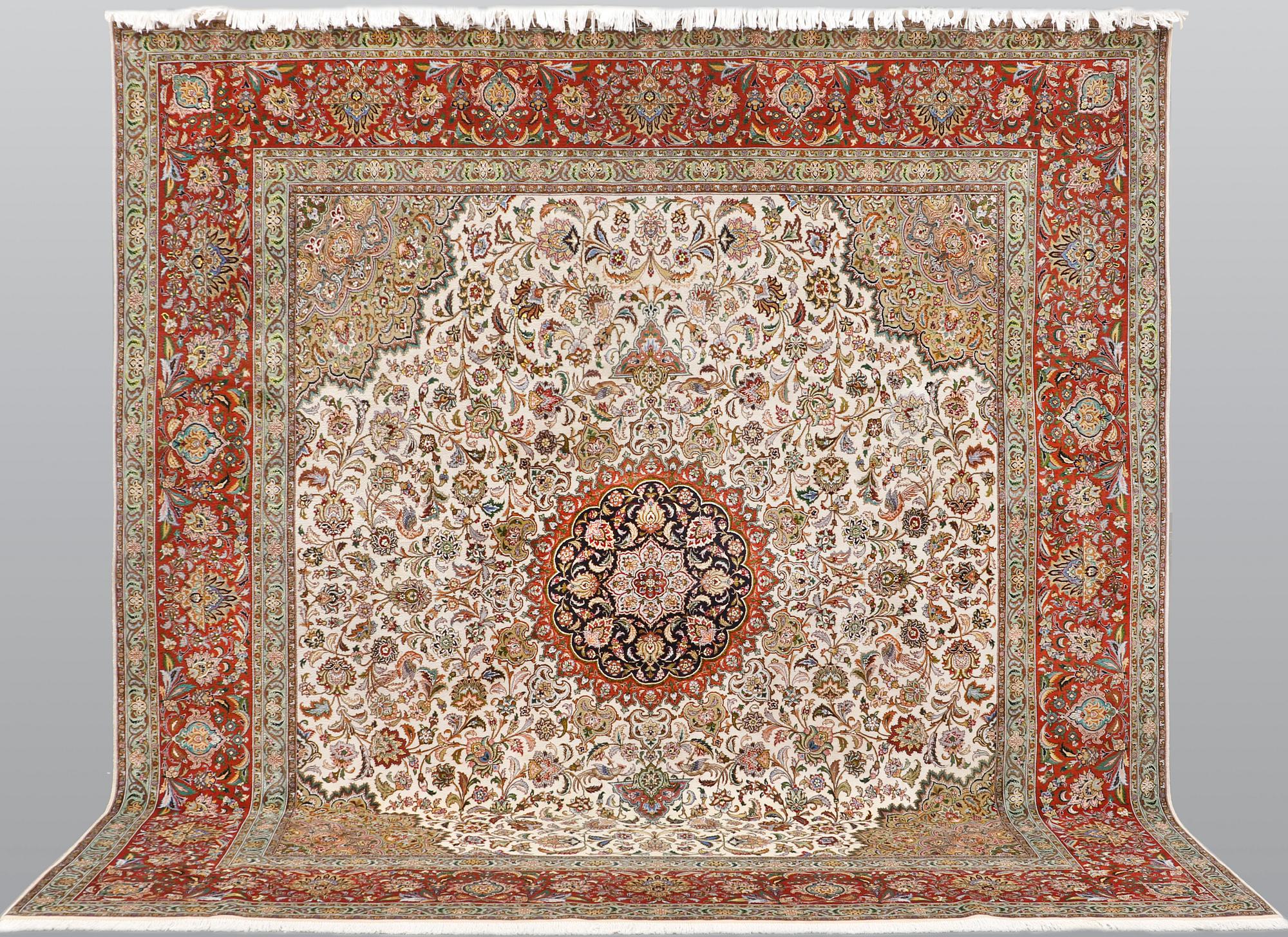 A part silk Tabriz carpet, sk 50 Radj, ca 312 x 296 cm.