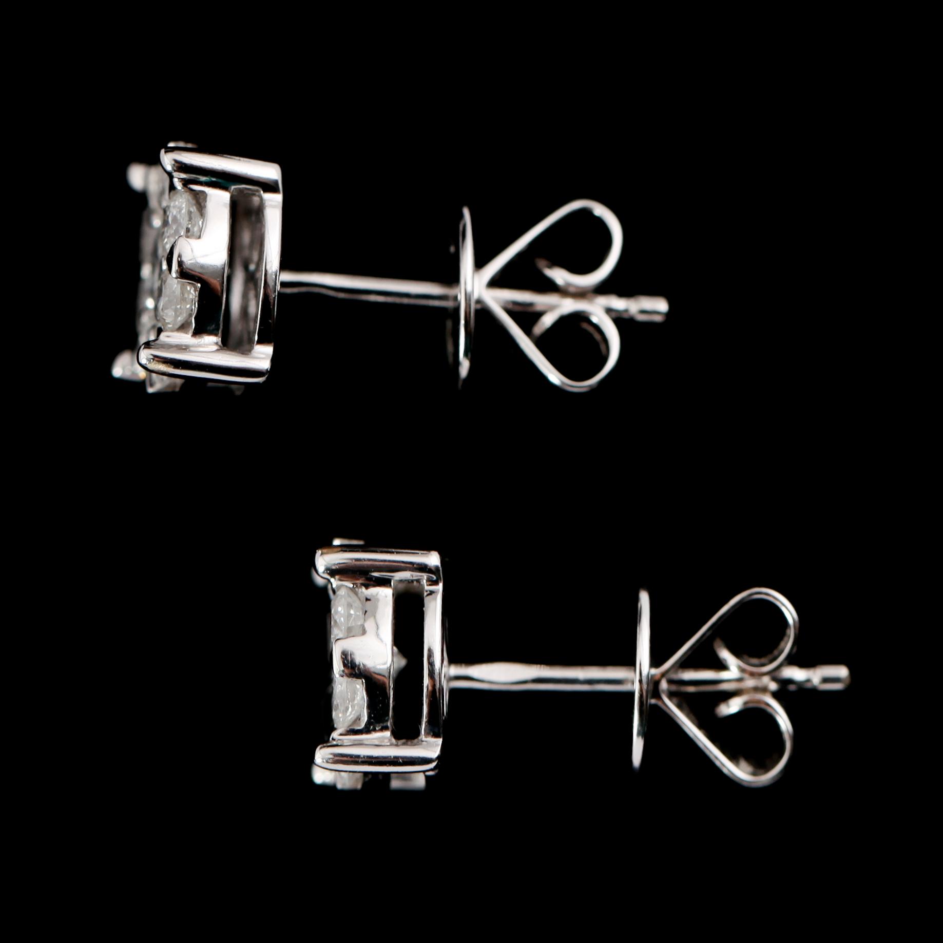 ÖRHÄNGEN, 1 par, 18 k vitguld, med briljantslipade diamanter totalt 1.04 ct.