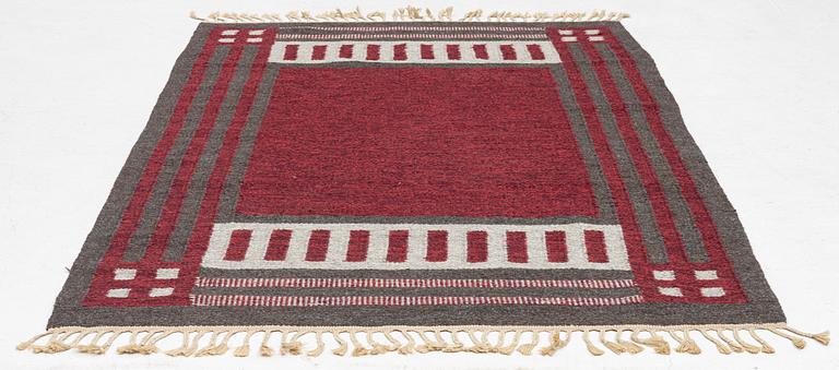 Kerstin Butler attributed, a carpet flat weave c 214 x 144 cm.