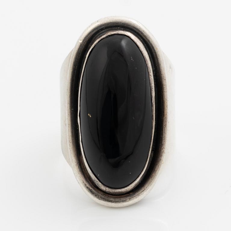 Ring, Carl Ove Frydensberg, silver with cabochon-cut black stone, Denmark.