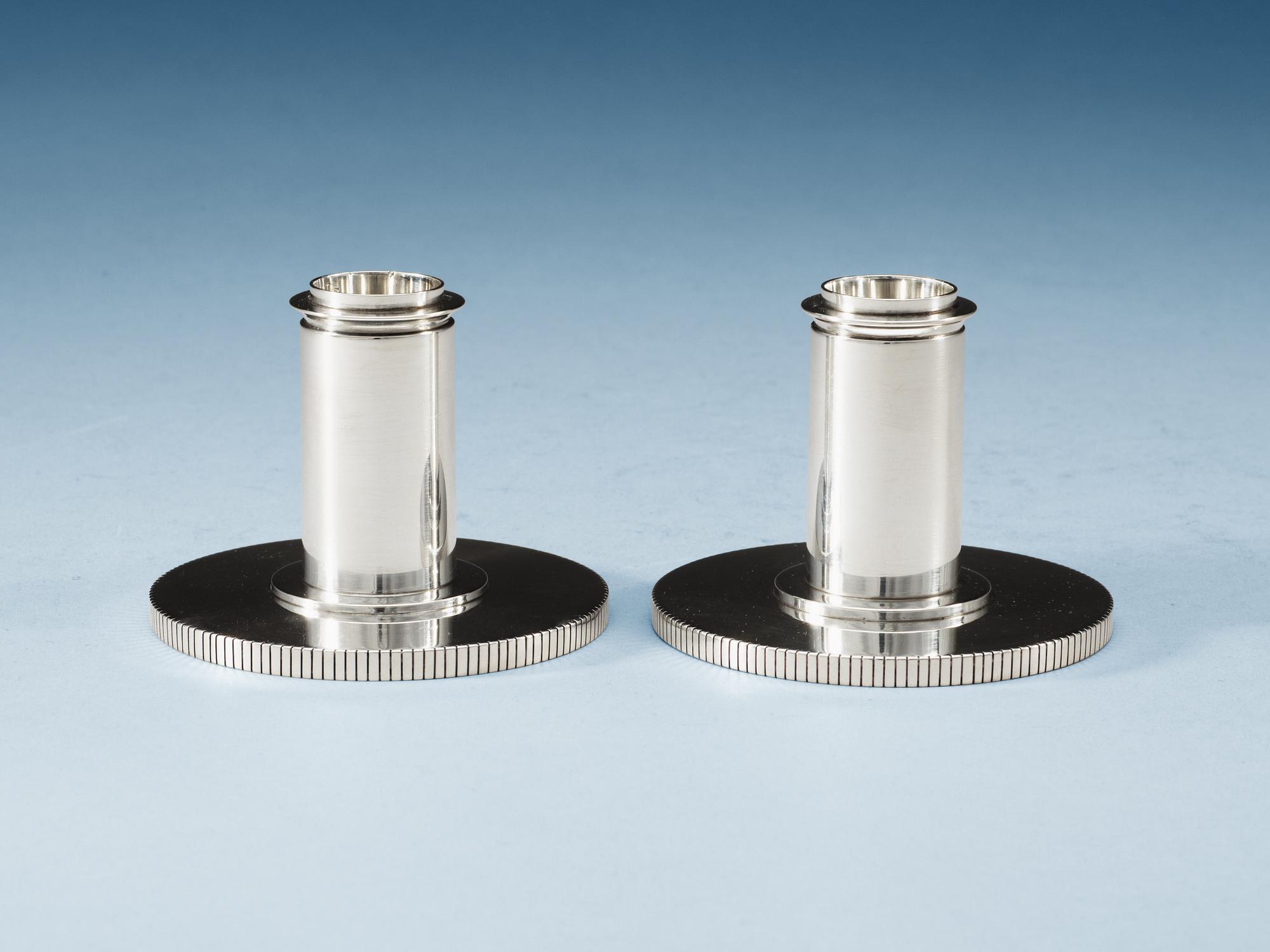 A pair of sterling Sigvard Bernadotte candlesticks.