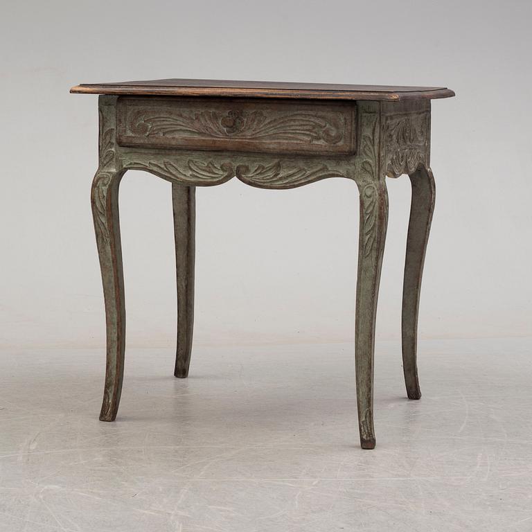 A french rococo-style table, 19th century.